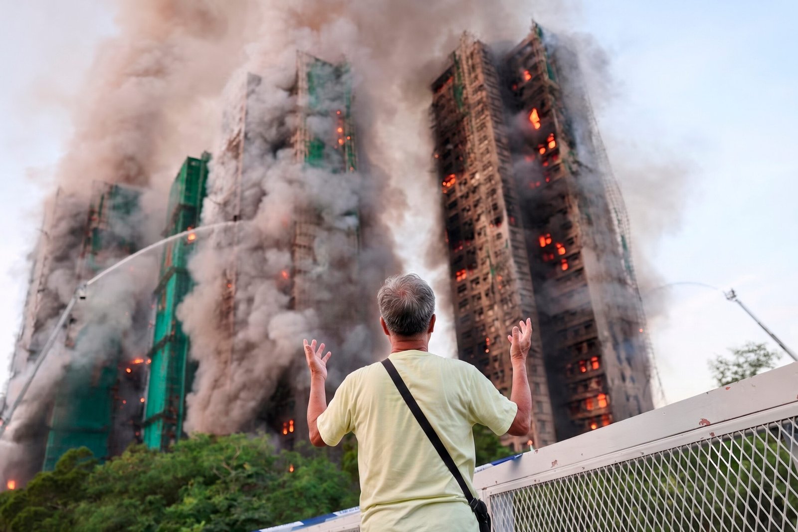 Hong Kong charges 7 people and 2 firms over massive fire that killed 168